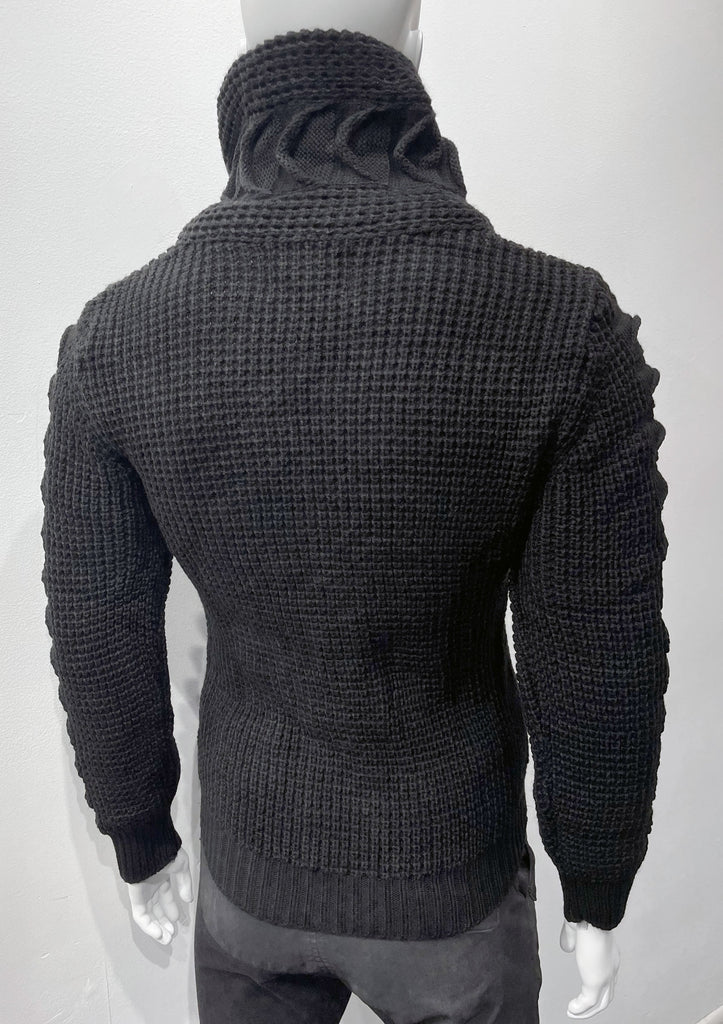Black high-collared cardigan sweater as seen from the back.