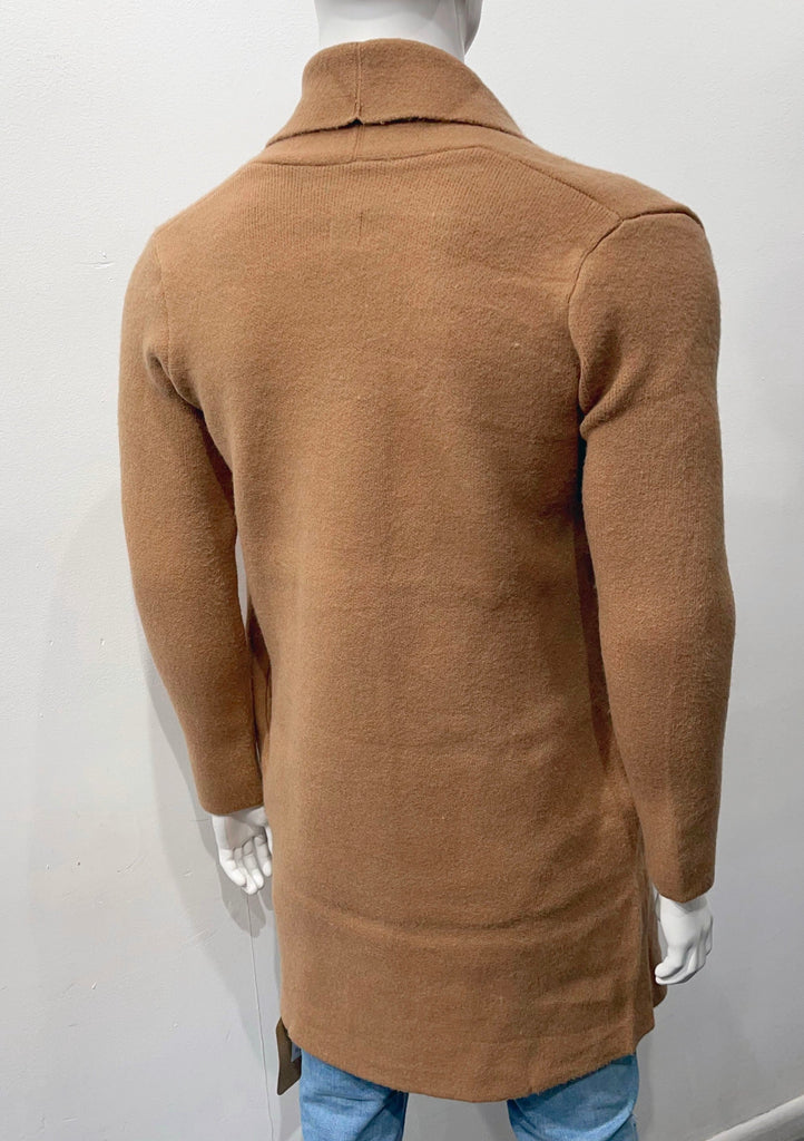 Camel buttonless collared wrap overcoat as seen from the back..