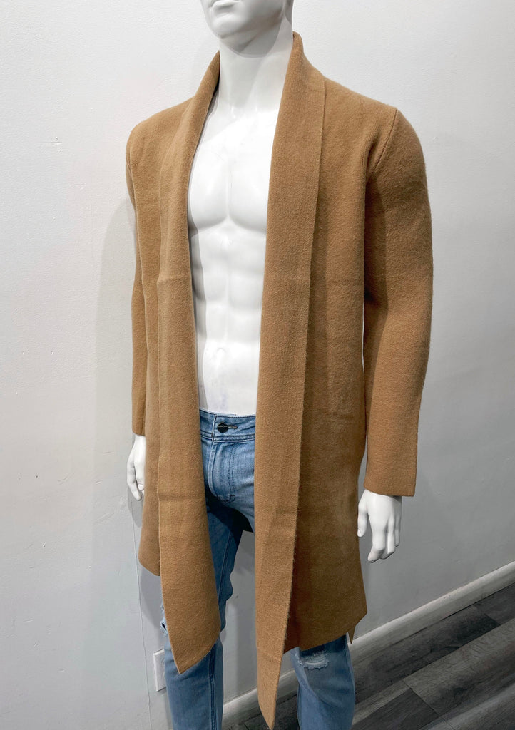 Camel buttonless collared wrap overcoat as seen from the front.