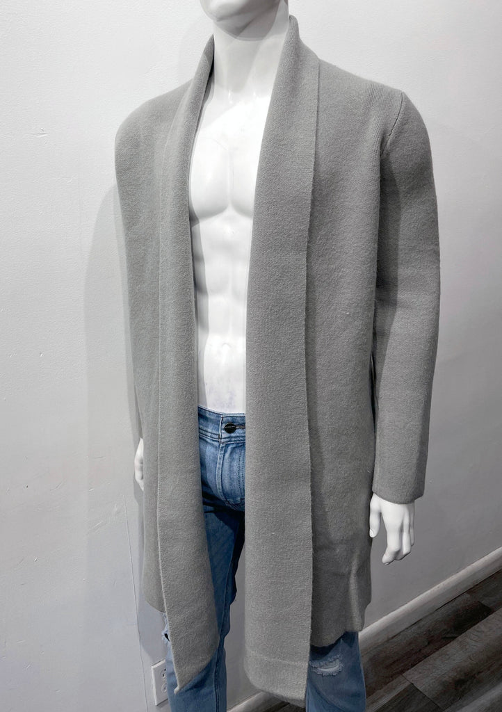 Grey buttonless collared wrap overcoat as seen from the front.