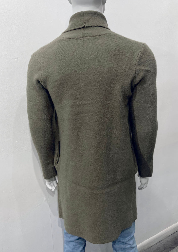 Olive buttonless collared wrap overcoat as seen from the back.