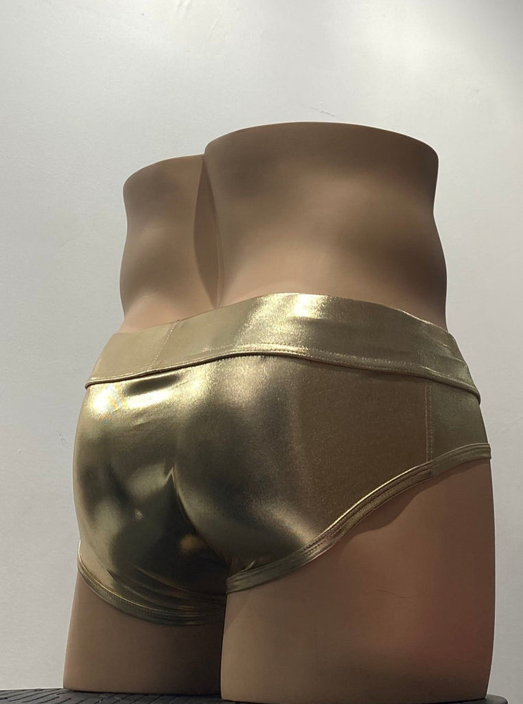 Shiny, laminated gold stretch brief, as seen from the back. It has a thick, shiny gold waistband.
