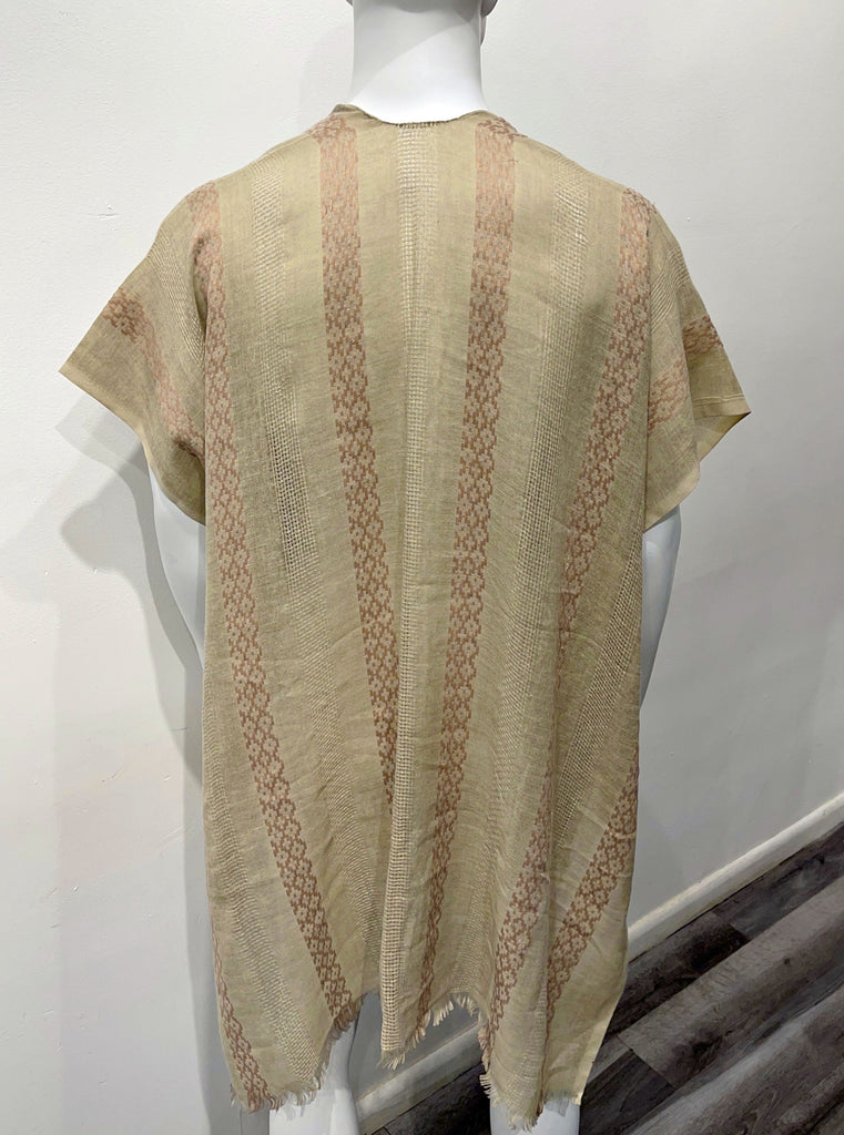 Tan color kimono as seen from the back, with woven vertical stripes of light brown and tan cross-stitched detailing on the back of the garment.