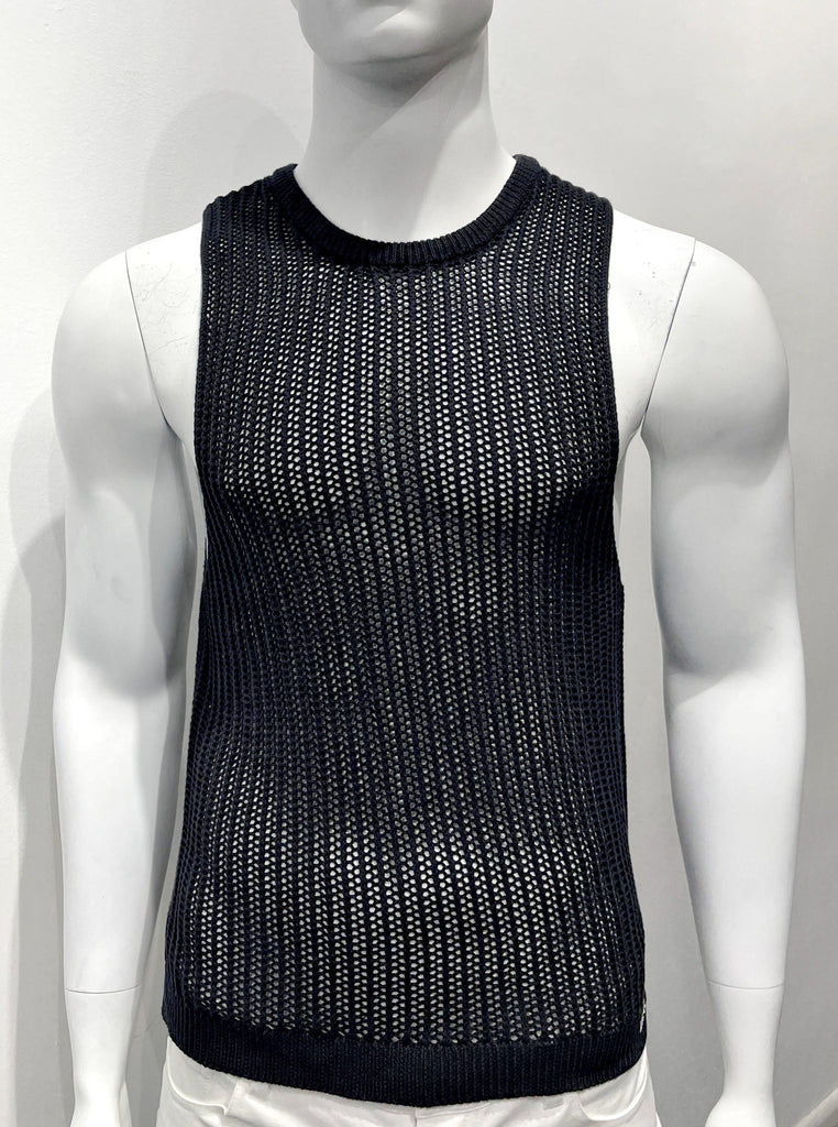 Black knit tank top as seen from the front. It is made with an open stitch pattern so it is partially see-through.