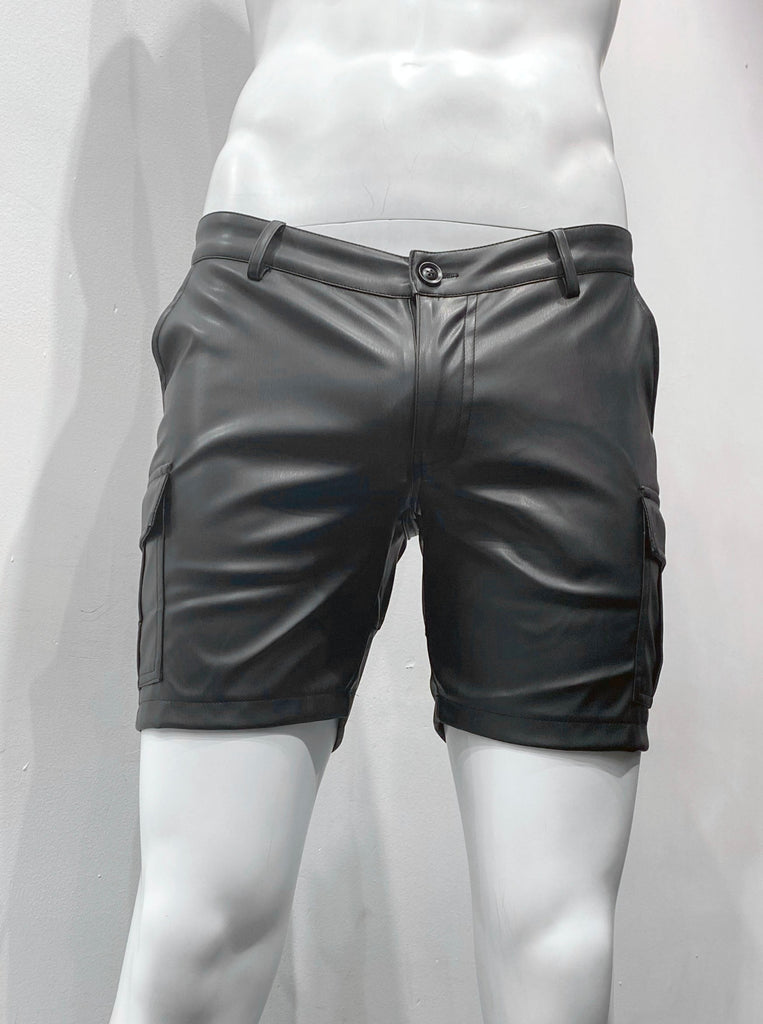 Black leather utility shorts as see from the front. Utility pockets on the side of each leg.