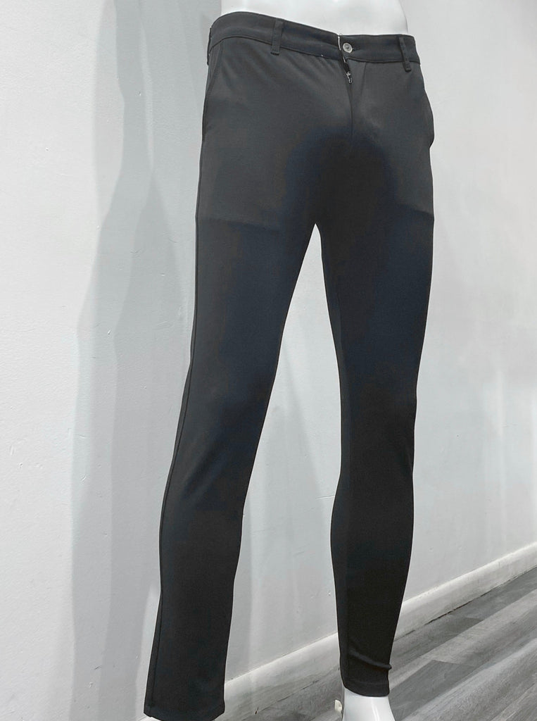 Black slim fit pants as seen from the front.