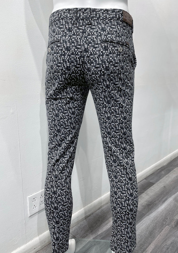 Dark grey flat front pants with a mini black and white square pattern, as seen from the back.