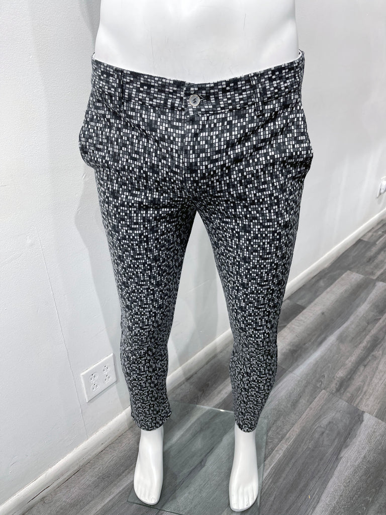 Dark grey flat front pants with a mini black and white square pattern, as seen from the front.