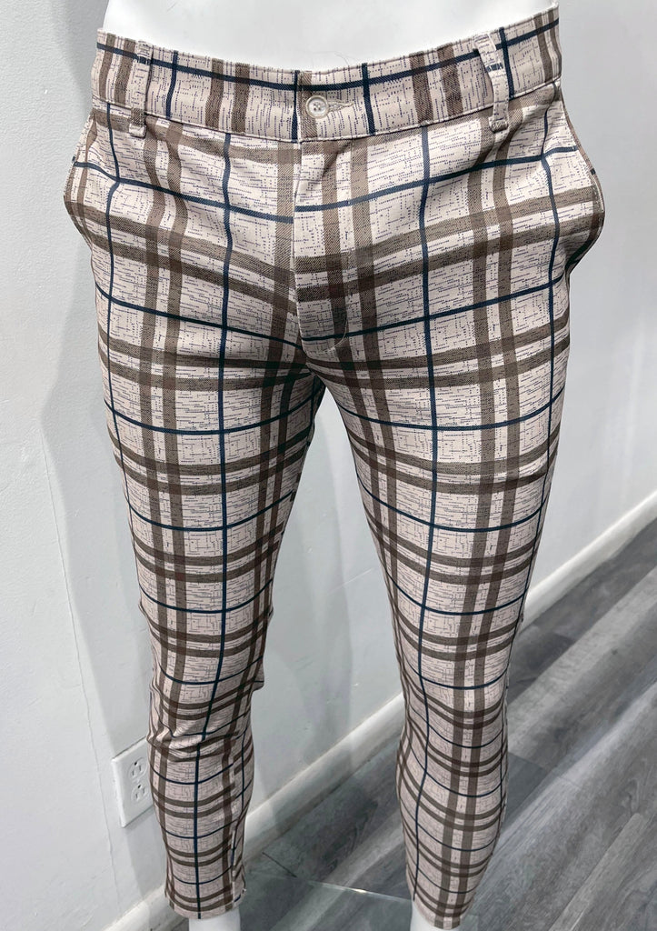 Light brown flat front pants with dark brown and dark blue plaid pattern, as seen from the front.