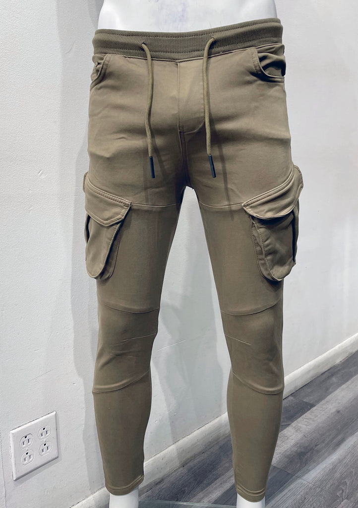 Khaki slim fit cargo jogger pants as seen from the front with drawstring elastic waistband.