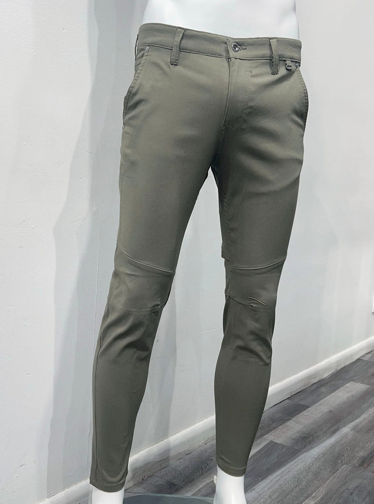 Olive-green, slim fit fashion pants with utility pant design detailing as seen from the front.