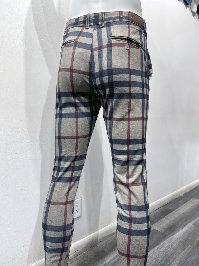 Light brown flat front pants with black and burgundy plaid pattern, as seen from the back.