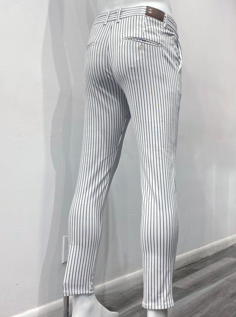 White slim fit pants with thin vertical navy stripes, as seen from the back.