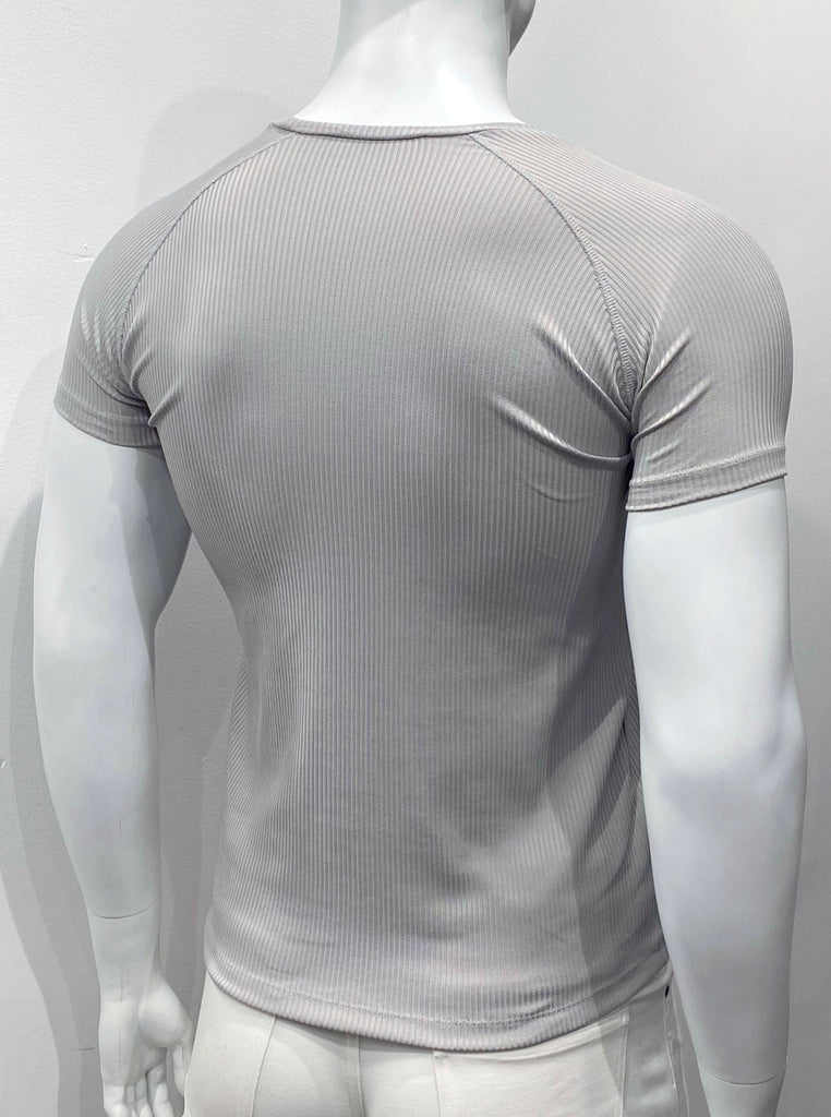Grey, ribbed, V-neck T-shirt as seen from the back.