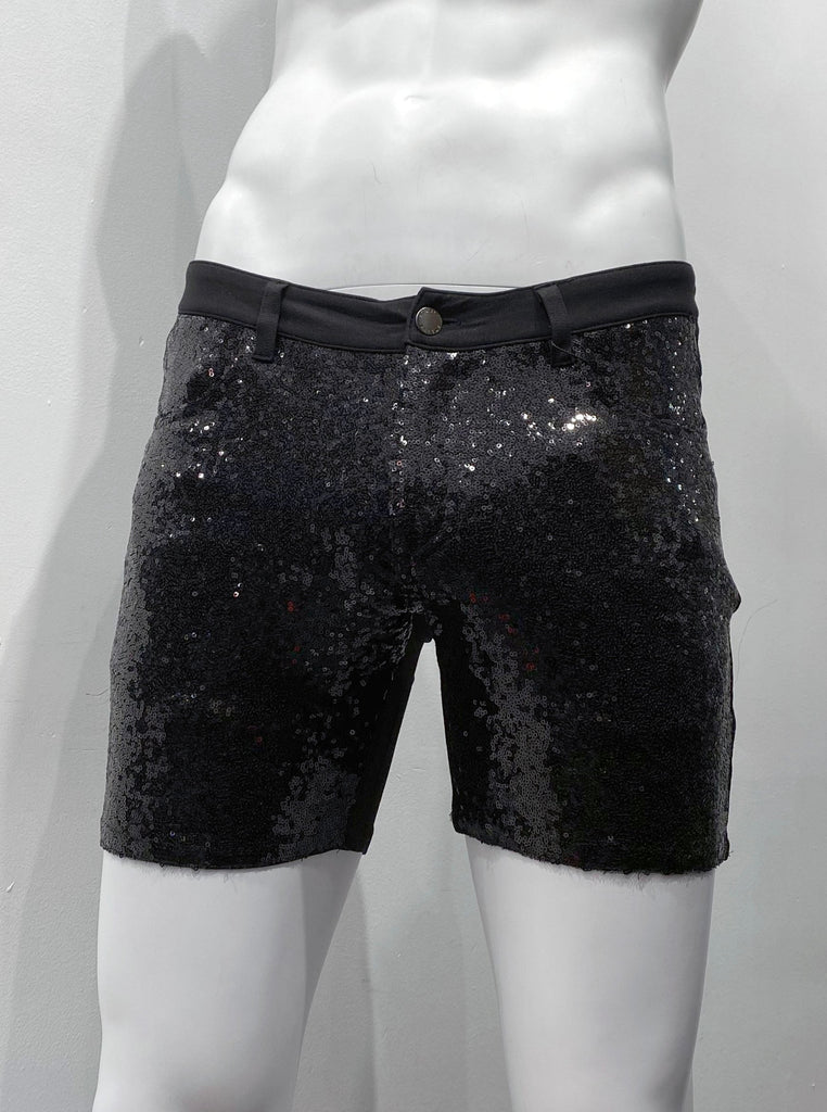 Black 5-pocket, zip-front, stretch knit shorts with black sequins covering the front, as seen from the front. There re no sequins on the waistband and belt loops.