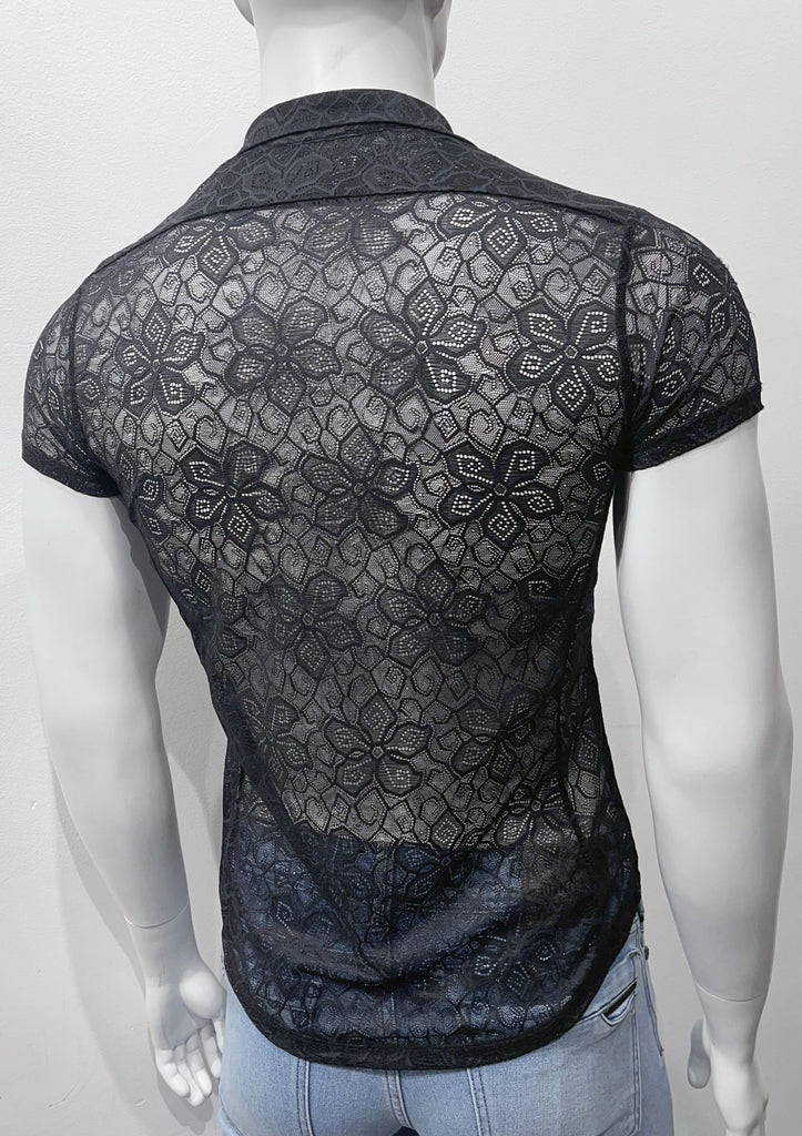 Black, short-sleeved, button-down floral lace shirt, as seen from the back.