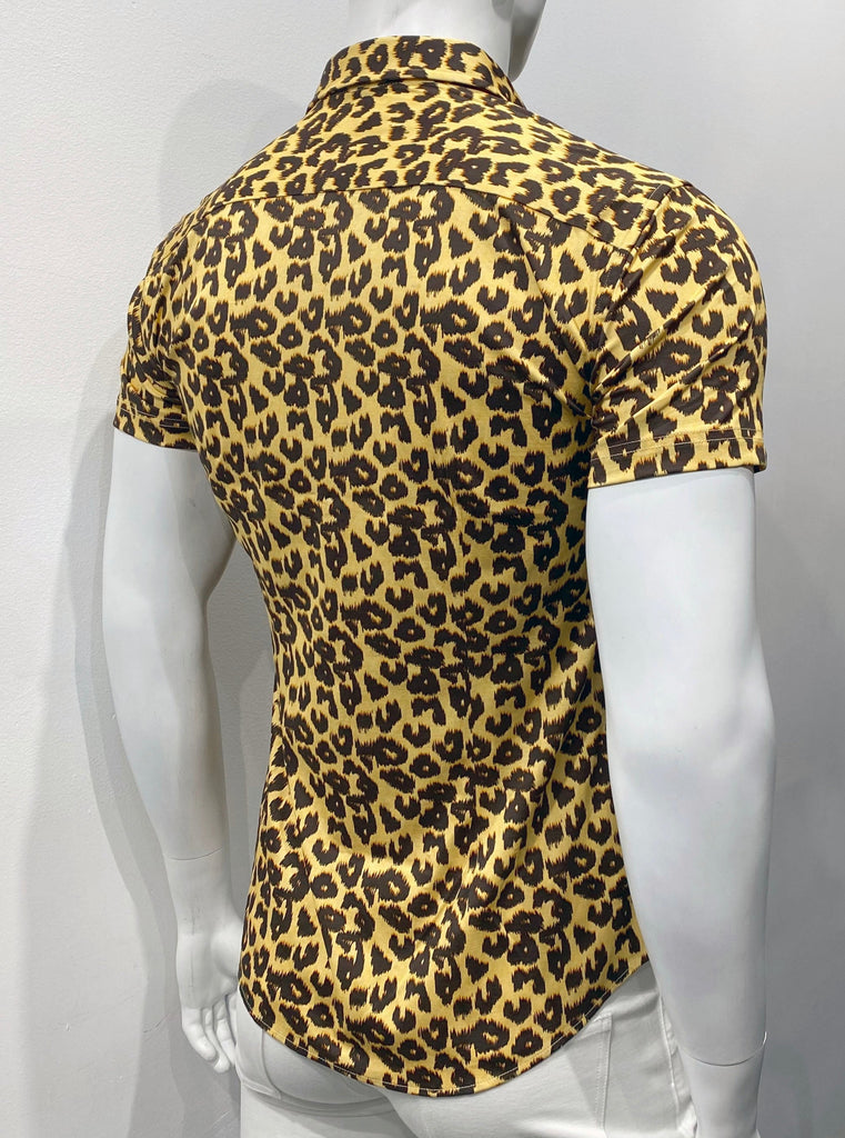 Short sleeve button-down shirt with leopard print as seen from the back.