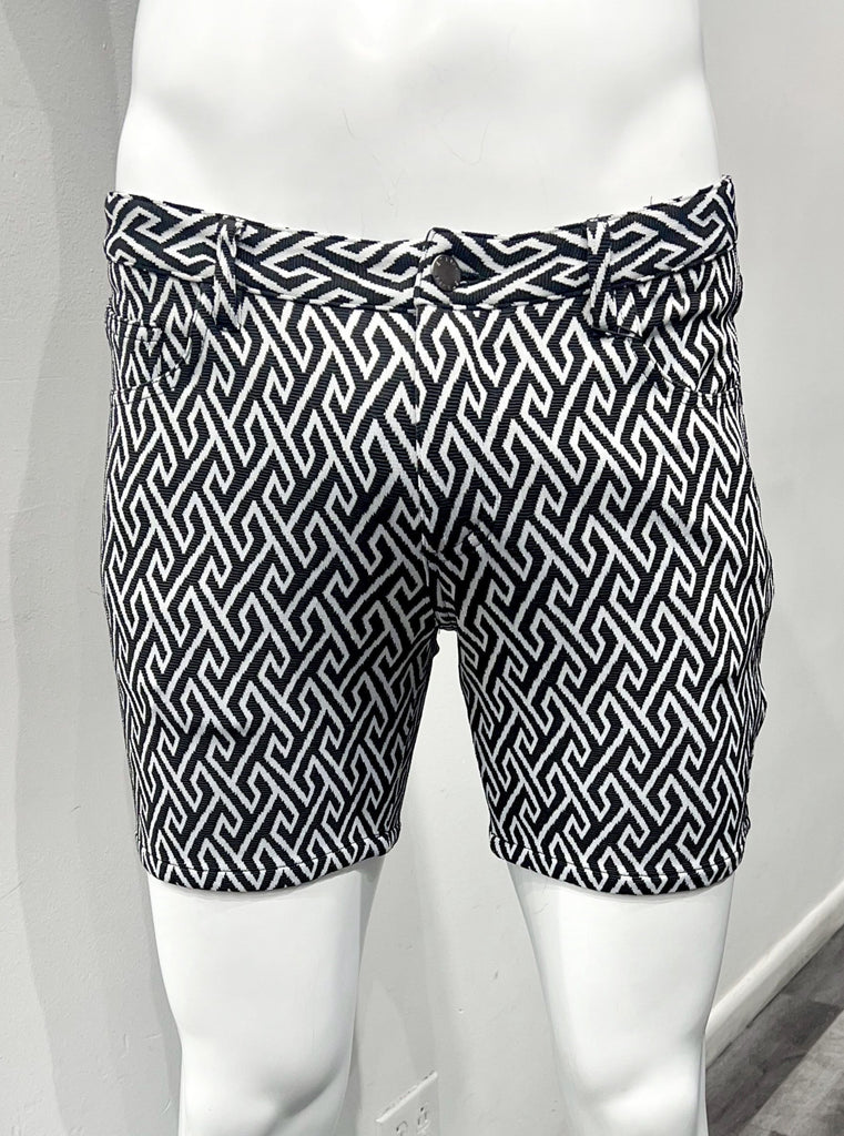 5-pocket stretch knit shorts with a black and white angle maze pattern, as seen from the front.