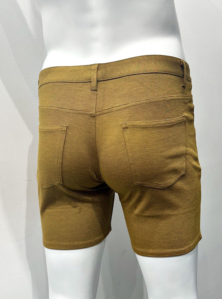 Butterscotch colored 5-pocket stretch knit shorts, as seen from the back.