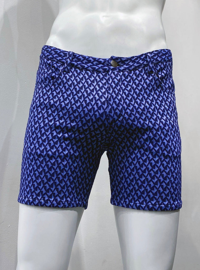 Zip-front, 5-pocket black stretch knit shorts as seen from the front, with a textured navy blue, violet and sky blue chevron grid pattern.