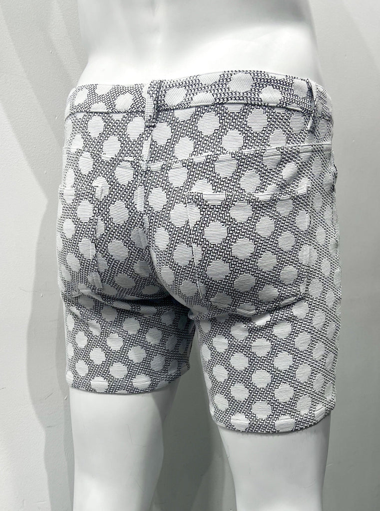 Grey 5-pocket stretch knit shorts with a pattern of same-size round white cloud puffs, as seen from the back.