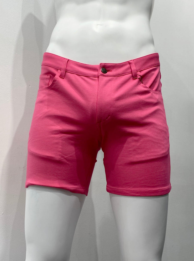 Fuchsia, zip-front, 5-pocket stretch knit shorts, as seen from the front.