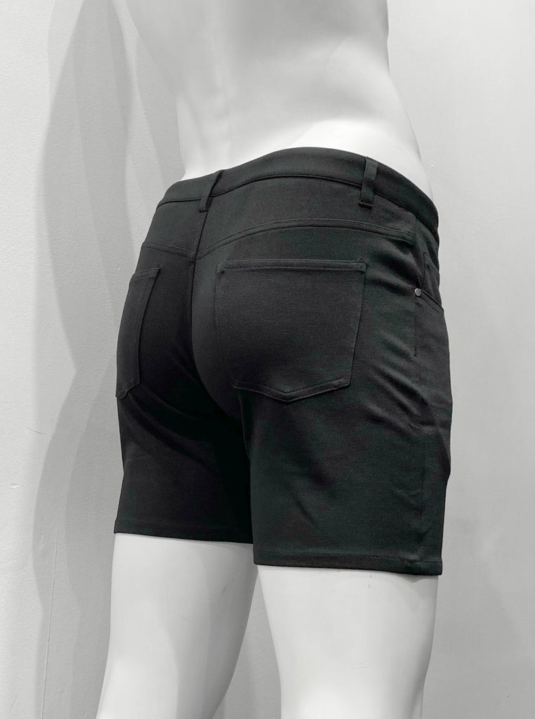 Black, zip-front, 5-pocket stretch knit shorts, as seen from the back.