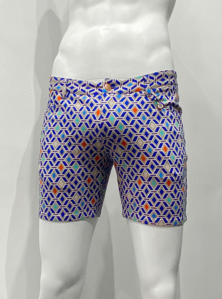 Zip-front, five-pocket stretch knit shorts as seen from the front, with a geometric pattern of grey, dark blue, royal blue, turquoise, and orange diamonds on grey background.