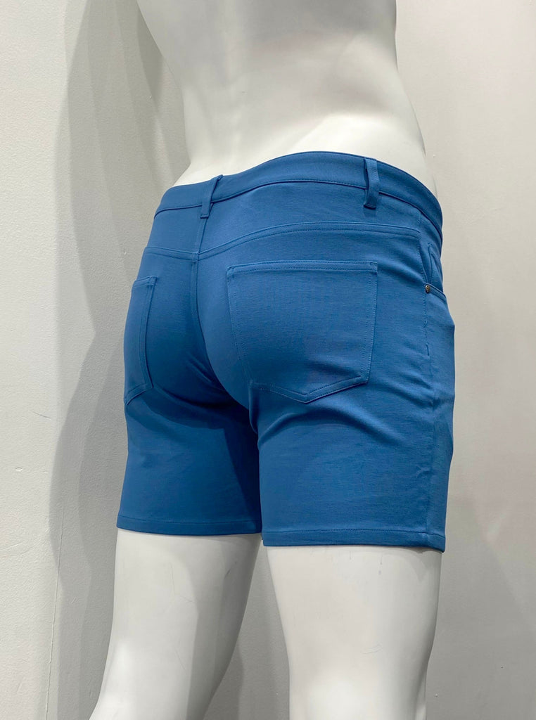 Marine blue, zip-front, 5-pocket stretch knit shorts, as seen from the front.