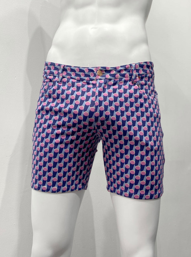 Zip-front, 5-pocket lavender stretch knit shorts as seen from the front, with a pattern of a crowd of standing blue cylinders with pink ends.