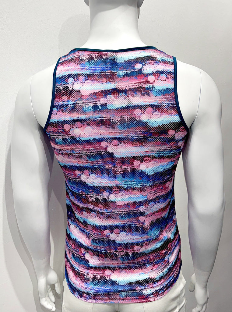 Tank top made from perforated mesh material as seen from the back, with a vibrant wine, pink, blue, light blue and white color print. There is teal piping on both sides of the shoulder straps.