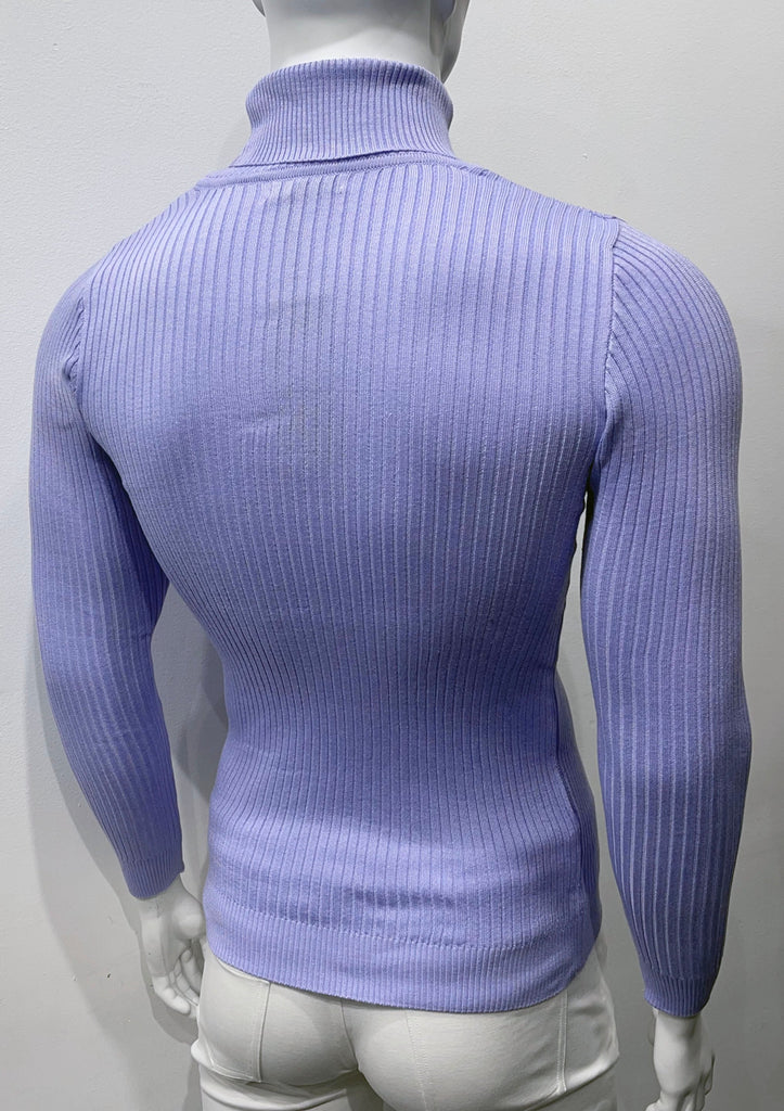Lilac long-sleeve, turtleneck sweater as seen from the back. There is a vertical ribbed pattern woven into the knit fabric.