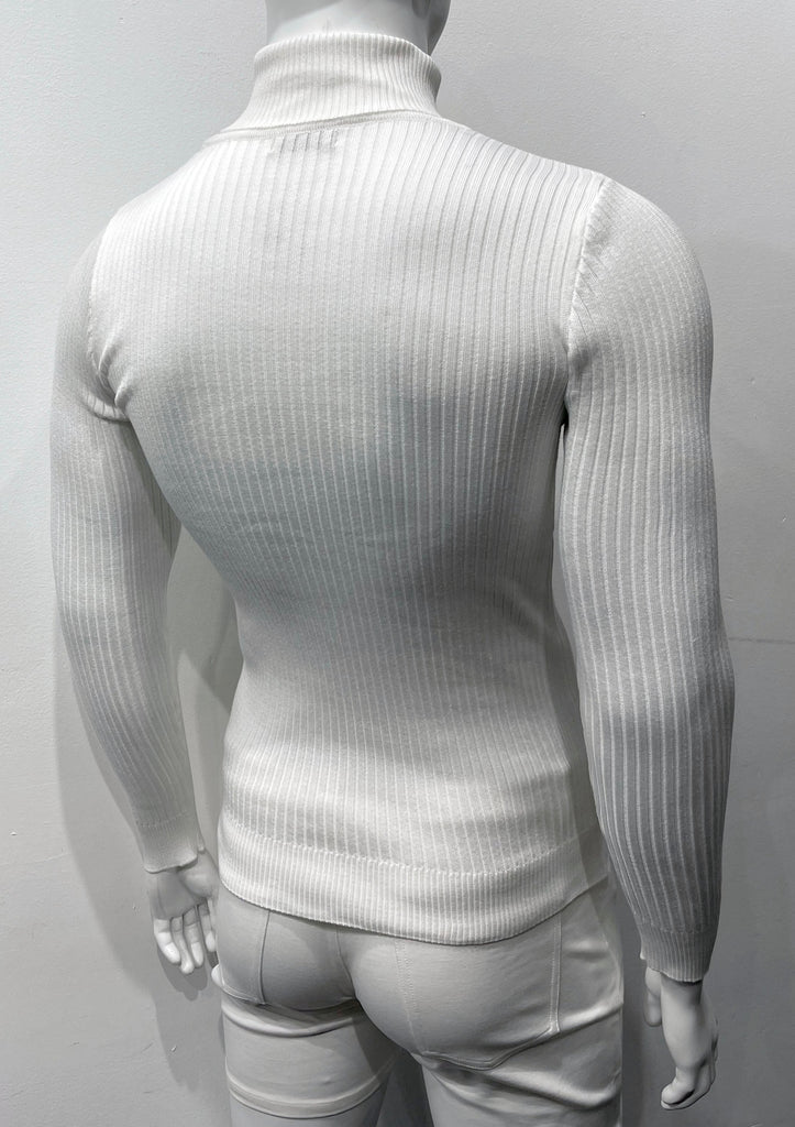 White long-sleeve, turtleneck sweater as seen from the back. There is a vertical ribbed pattern woven into the knit fabric.
