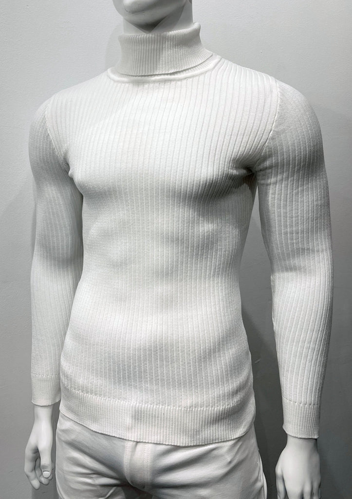 White long-sleeve, turtleneck sweater as seen from the front. There is a vertical ribbed pattern woven into the knit fabric.