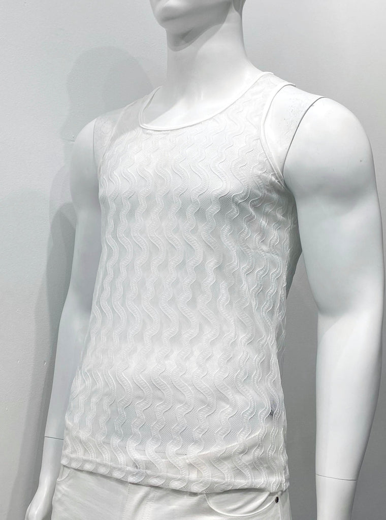 White lace tank top made with a wavy vertical gossamer pattern woven into the lace, as seen from the front.
