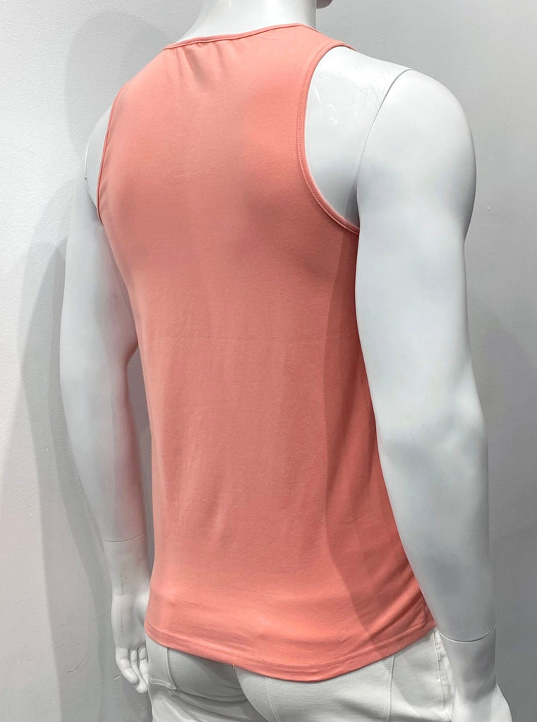 Salmon colored tank top as seen from the back.
